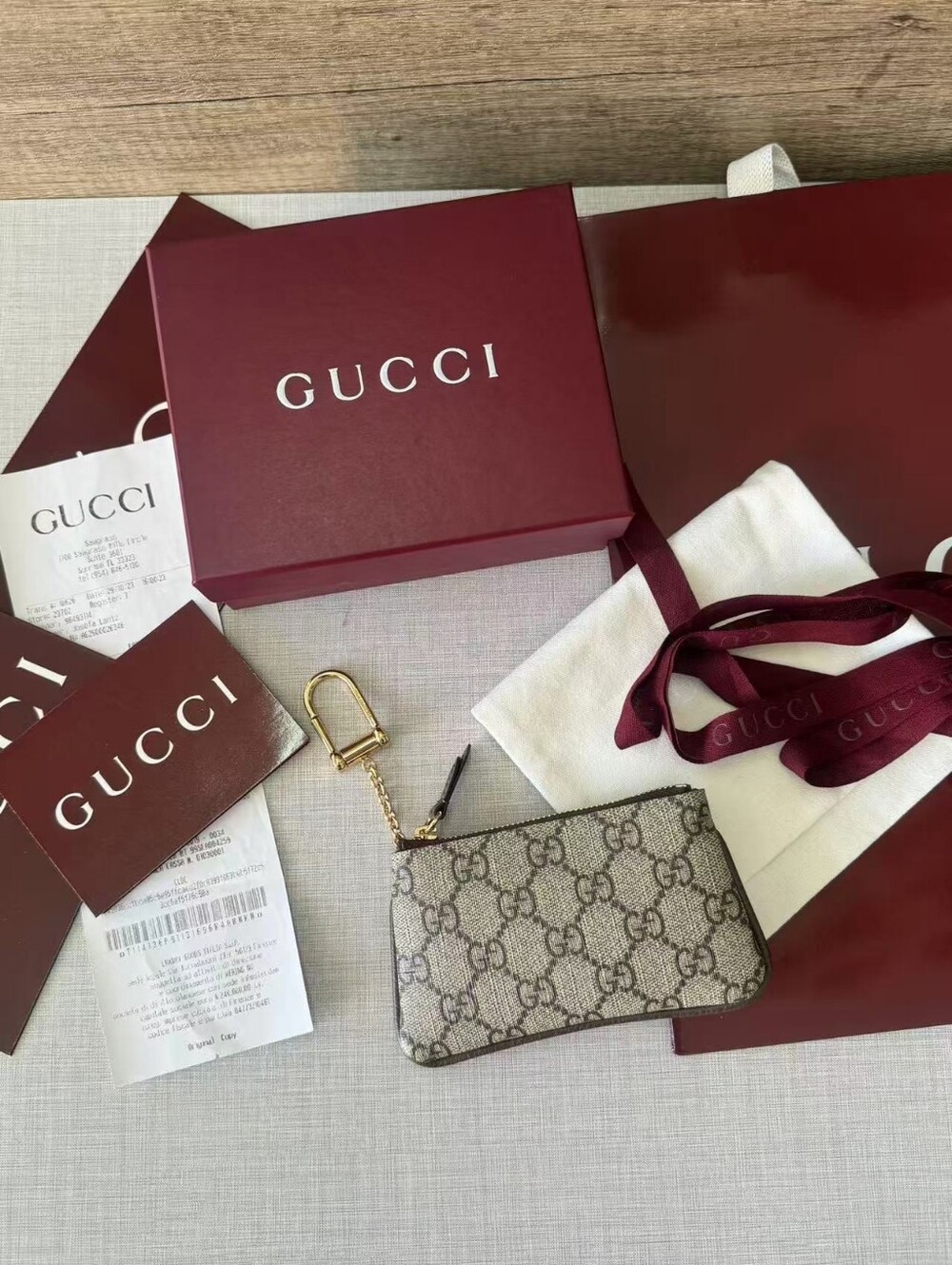 GUCCI Beige GG Supreme Key Pouch with Gold Hardware